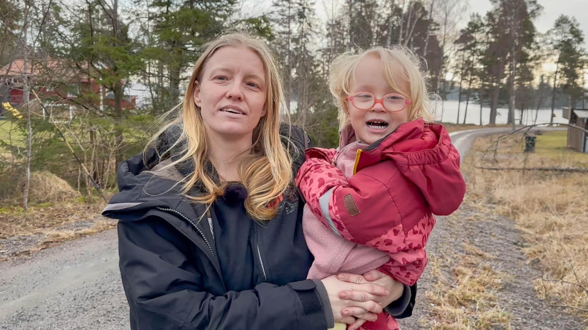 Woman holding a child